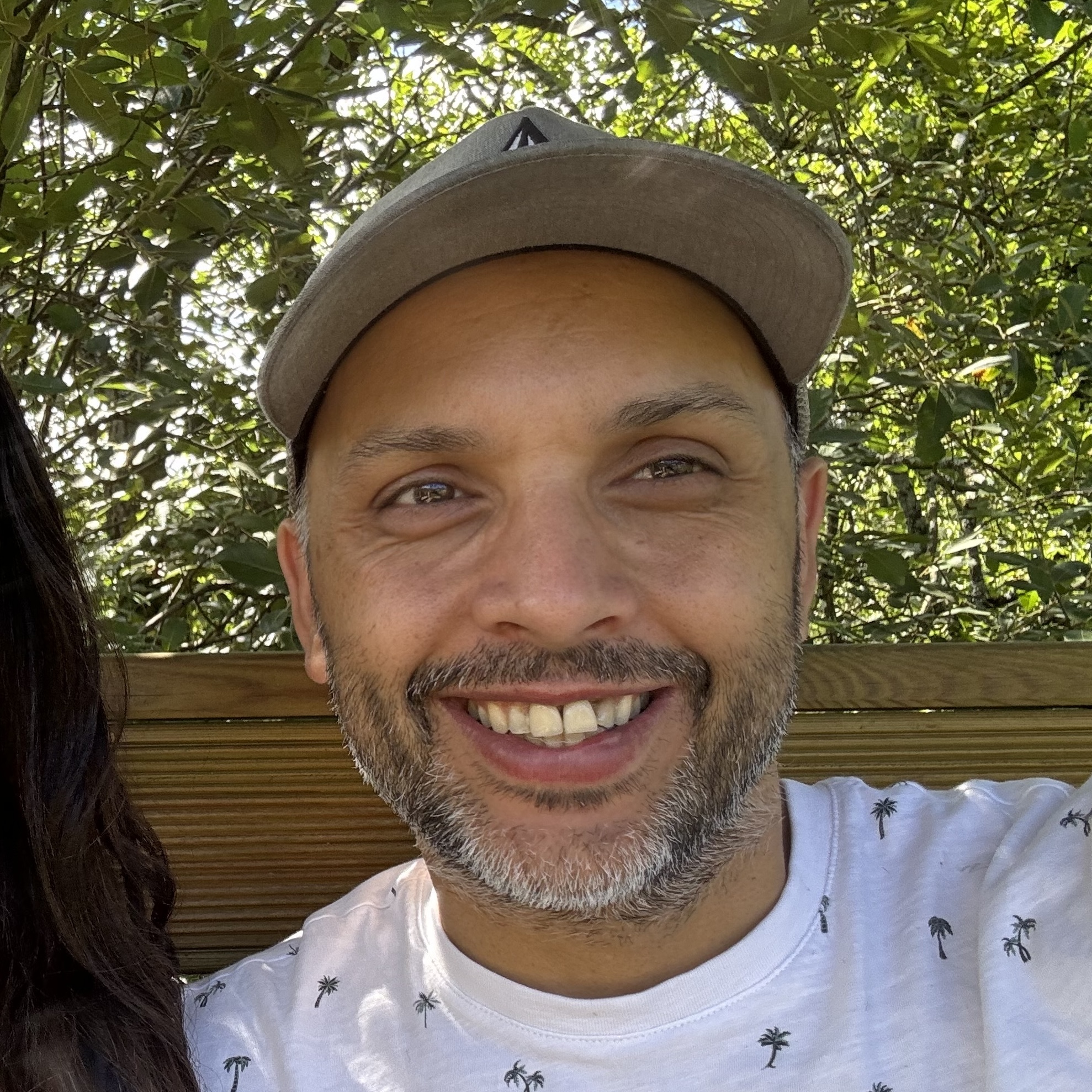 Barry Khan smiling at camera